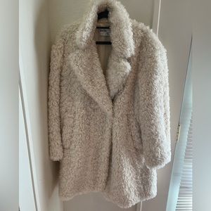 White fuzzy coat